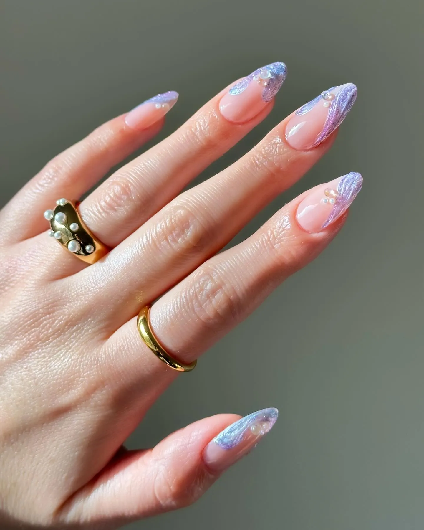 Mermaid-shimmer French manicure with raised water droplets