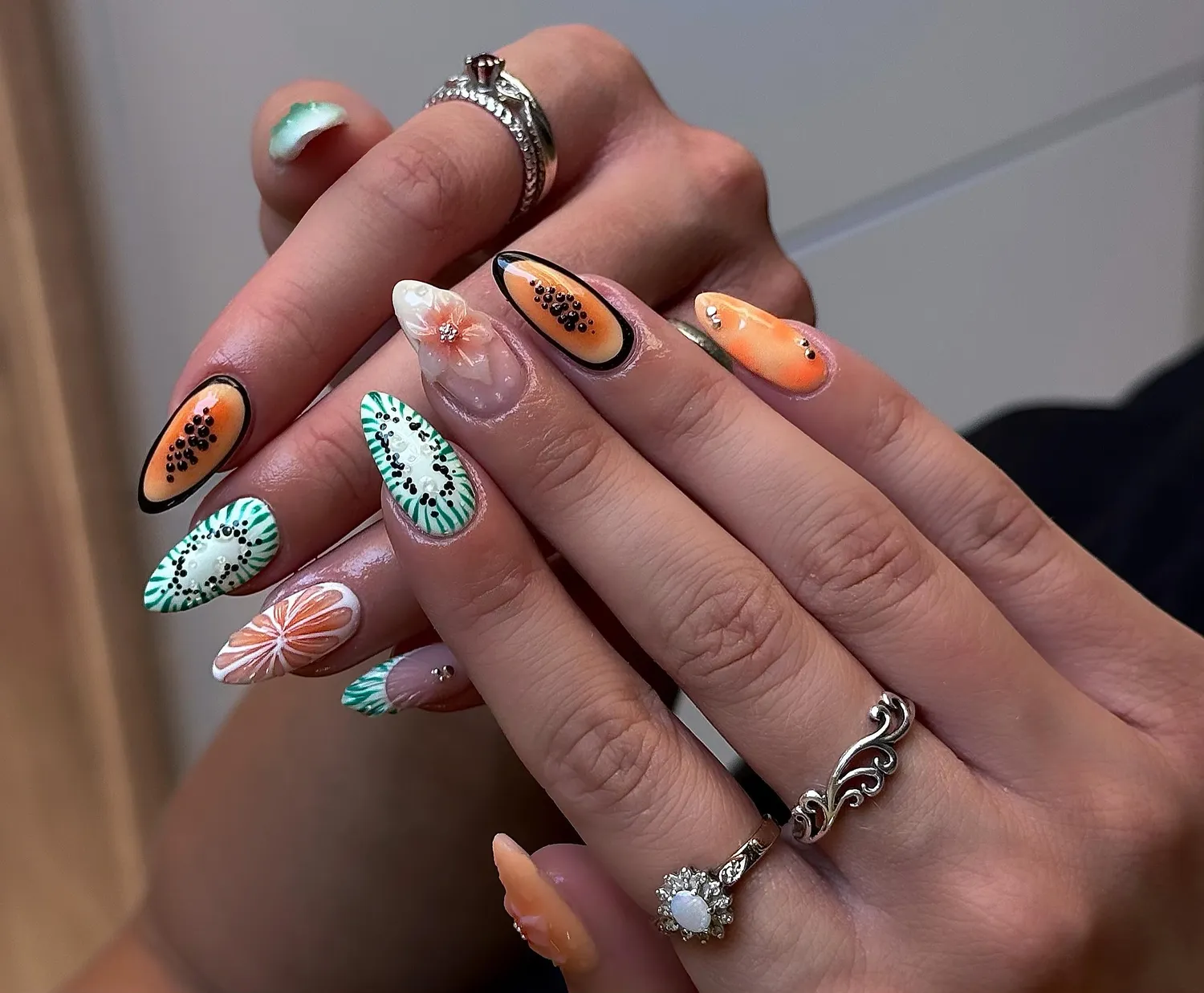 Tropical fruit-and-flower maximalist nail art